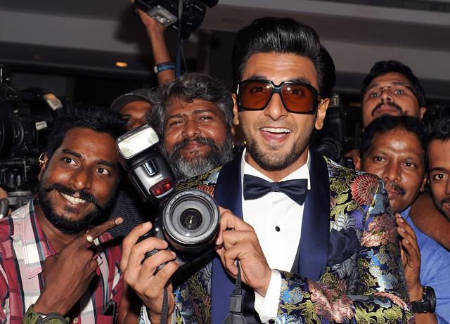 Indian Bollywood actor Ranveer Singh poses with media photographers during the Hello Hall of Fame Awards 2018. (AFP) Indian Bollywood actor Ranveer Singh poses with media photographers during the Hello Hall of Fame Awards 2018. (AFP)