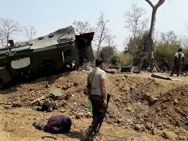 Security personnel inspect the site of an IED blast where nine CRPF personnel were killed and two more were injured after Maoists ambushed them in Kistaram area of Chhattisgarh’s Sukma district on Tuesday. (PTI Photo) Security personnel inspect the site of an IED blast where nine CRPF personnel were killed and two more were injured after Maoists ambushed them in Kistaram area of Chhattisgarh’s Sukma district on Tuesday. (PTI Photo)