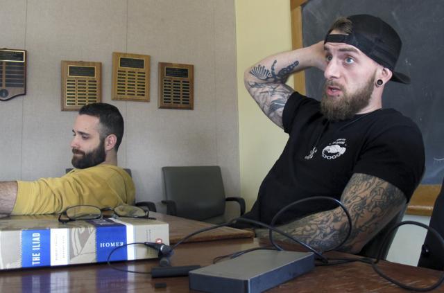 University of Vermont student veterans Thomas Moore (left) and Dan Wright, participate in a class studying Homer's The Iliad and The Odyssey in Burlington (AP Photo/Wilson Ring) University of Vermont student veterans Thomas Moore (left) and Dan Wright, participate in a class studying Homer's The Iliad and The Odyssey in Burlington (AP Photo/Wilson Ring)