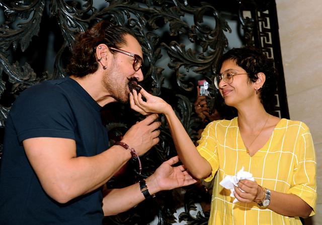 Kiran Rao Khan feeds birthday cake to Aamir. (AFP) Kiran Rao Khan feeds birthday cake to Aamir. (AFP)