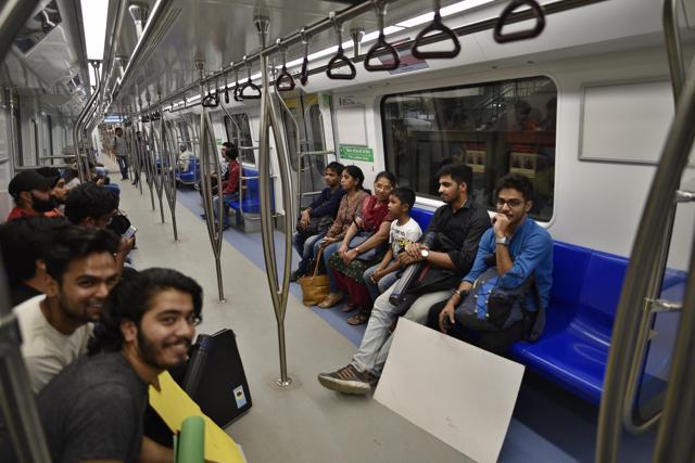 Passengers on board the Pink Line on Wednesday. Passengers on board the Pink Line on Wednesday.