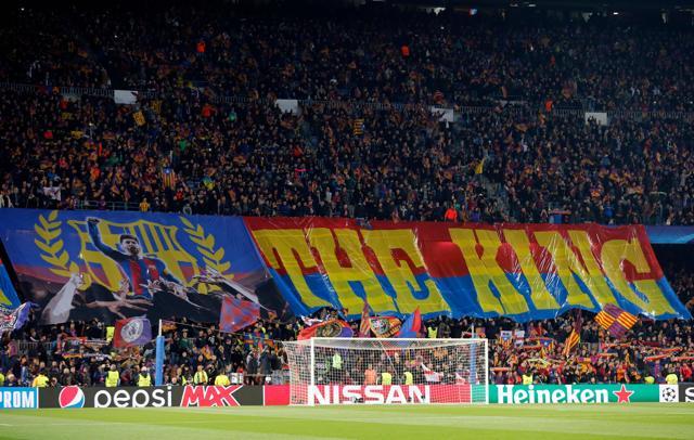 Barcelona's supporters hold a giant banner depicting Barcelona's Argentinian forward Lionel Messi during the UEFA Champions League round of 16 second-leg match vs Chelsea FC at the Camp Nou stadium in Barcelona on March 14, 2018. (AFP) Barcelona's supporters hold a giant banner depicting Barcelona's Argentinian forward Lionel Messi during the UEFA Champions League round of 16 second-leg match vs Chelsea FC at the Camp Nou stadium in Barcelona on March 14, 2018. (AFP)