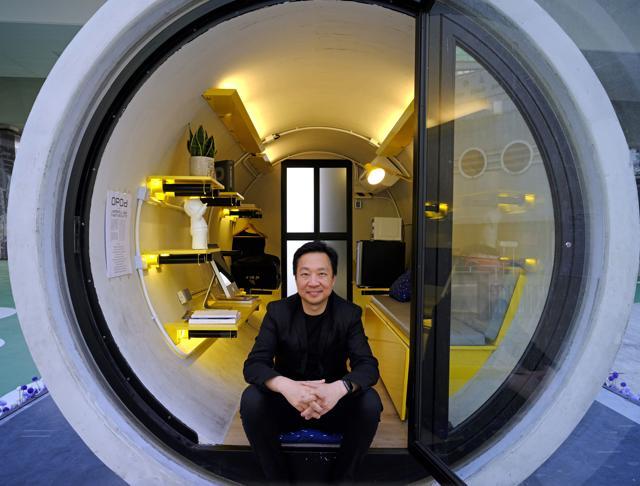 Architect James Law poses inside his OPod tube house. (AP) Architect James Law poses inside his OPod tube house. (AP)
