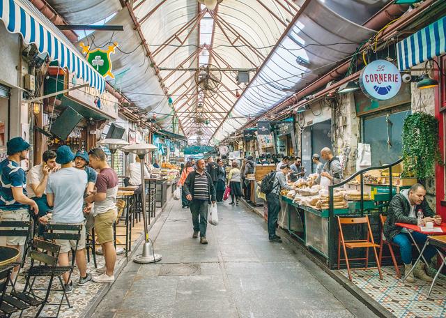 The Mahane Yehuda shuk in Jerusalem has lively nightlife options, with restaurants, bars and intimate music clubs (Shutterstock) The Mahane Yehuda shuk in Jerusalem has lively nightlife options, with restaurants, bars and intimate music clubs (Shutterstock)