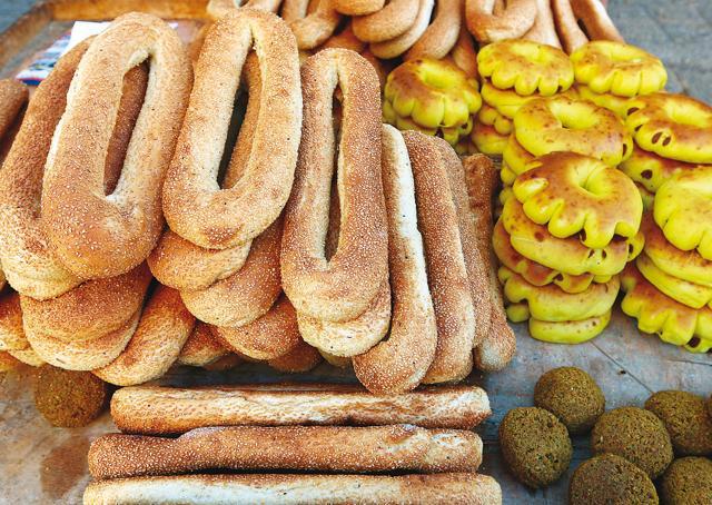 A common sight in Jerusalem is stacks of fancy breads at roadside stalls (Shutterstock) A common sight in Jerusalem is stacks of fancy breads at roadside stalls (Shutterstock)