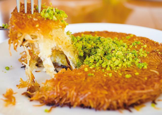 A popular dessert in the Middle East, the knafeh consists of filo pastry, cheese and syrup (Shutterstock) A popular dessert in the Middle East, the knafeh consists of filo pastry, cheese and syrup (Shutterstock)