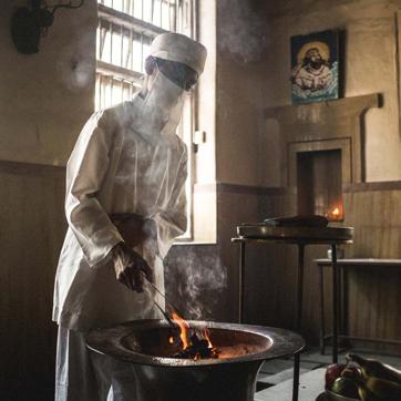 Shahvir practising a routine Zoroastrian ritual inside the Dadar Athornan Institute where he is learning how to became a priest (Dastur). As a Dastur, he will have to take care of the sacred fire inside the fire temple (agiary). (Courtesy: Majlend Bramo ) Shahvir practising a routine Zoroastrian ritual inside the Dadar Athornan Institute where he is learning how to became a priest (Dastur). As a Dastur, he will have to take care of the sacred fire inside the fire temple (agiary). (Courtesy: Majlend Bramo )