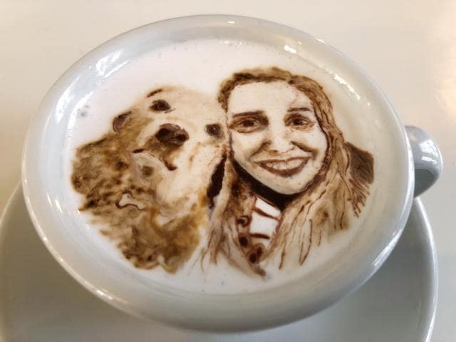 A portrait of writer Ashley Thomas with her dog Sandra, designed atop a cup of cold java by barista Lee Kang Bin at his coffee shop in Seoul, South Korea. (AP)