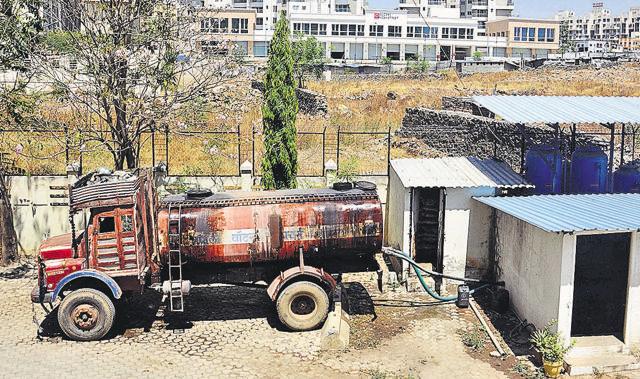 According to Kharadi residents, due to acute shortage of water, private water tanker owners have established a monopoly in the area and charge exorbitant rates for supplying water to housing societies. (Shankar Narayan/HT PHOTO) According to Kharadi residents, due to acute shortage of water, private water tanker owners have established a monopoly in the area and charge exorbitant rates for supplying water to housing societies. (Shankar Narayan/HT PHOTO)