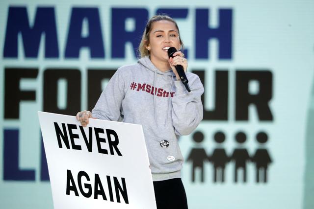 Miley Cyrus performs ‘The Climb’ during the March for Our Lives rally in Washington, DC. (AFP Photo) Miley Cyrus performs ‘The Climb’ during the March for Our Lives rally in Washington, DC. (AFP Photo)