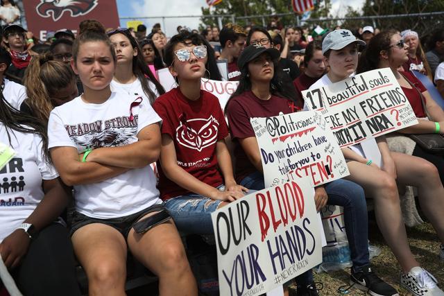 Marjory Stoneman Douglas High School students participate in the March For Our Lives event at Pine Trails Park before walking to the high school in Parkland, Florida. (AFP) Marjory Stoneman Douglas High School students participate in the March For Our Lives event at Pine Trails Park before walking to the high school in Parkland, Florida. (AFP)