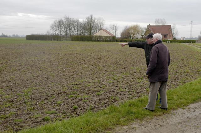 Marc Cooche, 84, and local Mayor Marc Deheele stand at the site where a war plane crashed during WWII in Buysscheure, northern France, on Thursday March 15, 2018. (AP Photo) Marc Cooche, 84, and local Mayor Marc Deheele stand at the site where a war plane crashed during WWII in Buysscheure, northern France, on Thursday March 15, 2018. (AP Photo)