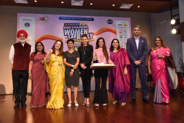 (L-R) Brig HPS Bedi, VSM, Advisor-Sports &amp; Youth Affairs Committee, Anuradha Goel, chairperson-PHD Family Welfare Foundation (WCD), Sita Raina, chairperson, women in motorsports, FMSCI (Federation of Motor Sports Clubs of India), Bani Yadav, Indian woman car rallyist, Dr Niharika Yadav, lady super biker, Priya Hingorani, co-chairperson, Sports &amp; Youth Affairs Committee, Arshad Nizam Shawl, co-chairman Sports &amp; Youth Affairs Committee, Karuna Shriram, co-chairperson, PHD Family Welfare Foundation (WCD), felicitated breast cancer survivors at the curtain raiser.