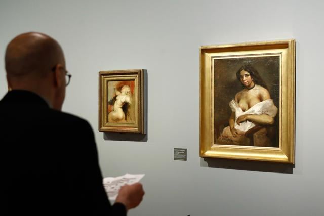 A man looks at the painting Aspasie la mauresque during a press visit of the exhibition. (AFP) A man looks at the painting Aspasie la mauresque during a press visit of the exhibition. (AFP)