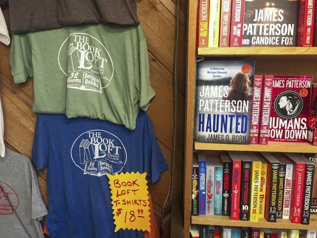 Books and store t-shirts on display. (AP Photo/Jonathan Elderfield) Books and store t-shirts on display. (AP Photo/Jonathan Elderfield)