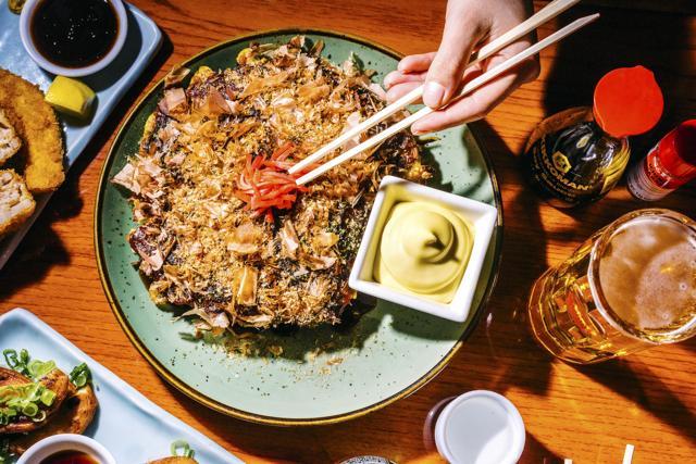 Okonomiyaki, at Village Yokocho. (Arturo Olmos/Bloomberg) Okonomiyaki, at Village Yokocho. (Arturo Olmos/Bloomberg)
