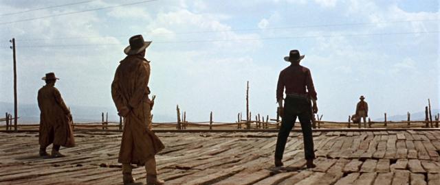 A classic tableau from Once Upon a Time in the West, shot by the great Tonino Delli Colli. A classic tableau from Once Upon a Time in the West, shot by the great Tonino Delli Colli.