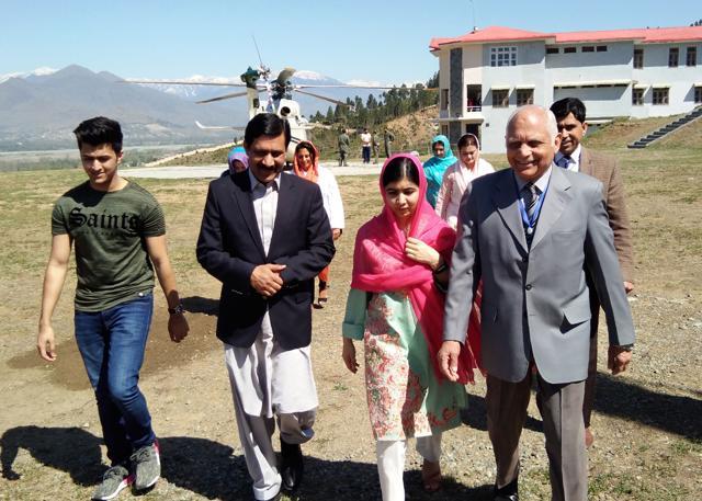 Pakistani activist and Nobel Peace Prize laureate Malala Yousafzai (C), arrives along with her father Ziauddin Yousafzai (2L), brother Atal Yousafzai (L) and the principal of all-boys Swat Cadet College Guli Bagh, during her hometown visit, some 15 kilometres outside of Mingora, on March 31. (AFP Photo) Pakistani activist and Nobel Peace Prize laureate Malala Yousafzai (C), arrives along with her father Ziauddin Yousafzai (2L), brother Atal Yousafzai (L) and the principal of all-boys Swat Cadet College Guli Bagh, during her hometown visit, some 15 kilometres outside of Mingora, on March 31. (AFP Photo)