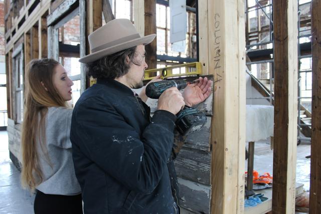 Artist Ryan Mendoza and his wife, Fabia Mendoza, put up siding, in Providence, on a house where Rosa Parks sought refuge after fleeing the South. (AP) Artist Ryan Mendoza and his wife, Fabia Mendoza, put up siding, in Providence, on a house where Rosa Parks sought refuge after fleeing the South. (AP)