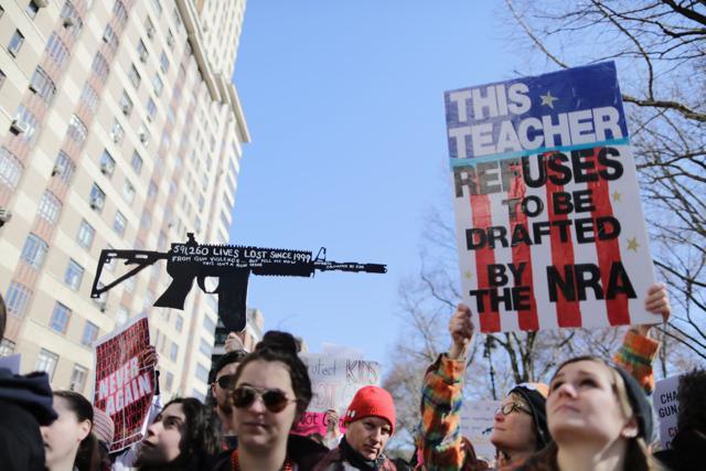 Participants take part in the March for Our Lives Rally in New York on March 24, 2018. Bundled against the cold but fired up with passion after a Florida high school massacre, crowds gathered in Washington on Saturday for what is expected to be the biggest US gun control protest in a generation, with hundreds of thousands attending. (AFP Photo) Participants take part in the March for Our Lives Rally in New York on March 24, 2018. Bundled against the cold but fired up with passion after a Florida high school massacre, crowds gathered in Washington on Saturday for what is expected to be the biggest US gun control protest in a generation, with hundreds of thousands attending. (AFP Photo)