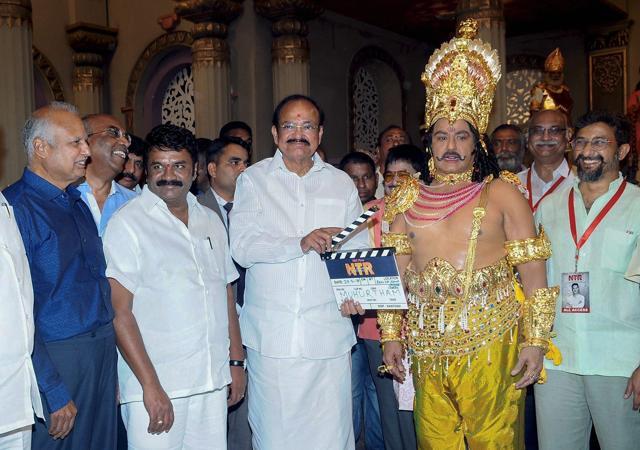 Vice President M Venkiah Naidu claps with a clapboard at the launch of a biopic on the former Chief Minister of Andhra Pradesh NT Rama Rao, in Hyderabad on Thursday. (PTI) Vice President M Venkiah Naidu claps with a clapboard at the launch of a biopic on the former Chief Minister of Andhra Pradesh NT Rama Rao, in Hyderabad on Thursday. (PTI)