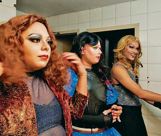 In this picture , taken by drag artists Lush, Kush and Betta, they can be seen changing into their costumes in the washroom of Tis Hazari metro station, Delhi. In this picture , taken by drag artists Lush, Kush and Betta, they can be seen changing into their costumes in the washroom of Tis Hazari metro station, Delhi.
