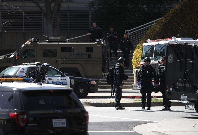 Police walk outside of the YouTube headquarters on April 3, 2018 in San Bruno, California. (AFP) Police walk outside of the YouTube headquarters on April 3, 2018 in San Bruno, California. (AFP)