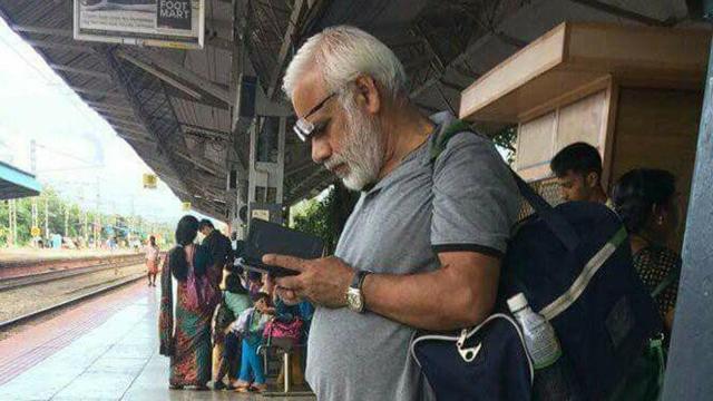 Ramachandran at Payyanur railway station last year — the photo that made him famous. (Twitter) Ramachandran at Payyanur railway station last year — the photo that made him famous. (Twitter)