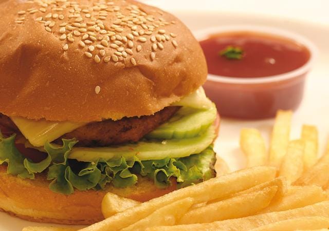 The patty of the burger, like the samosa, is made of potatoes, but is cooked with little oil (Shutterstock) The patty of the burger, like the samosa, is made of potatoes, but is cooked with little oil (Shutterstock)