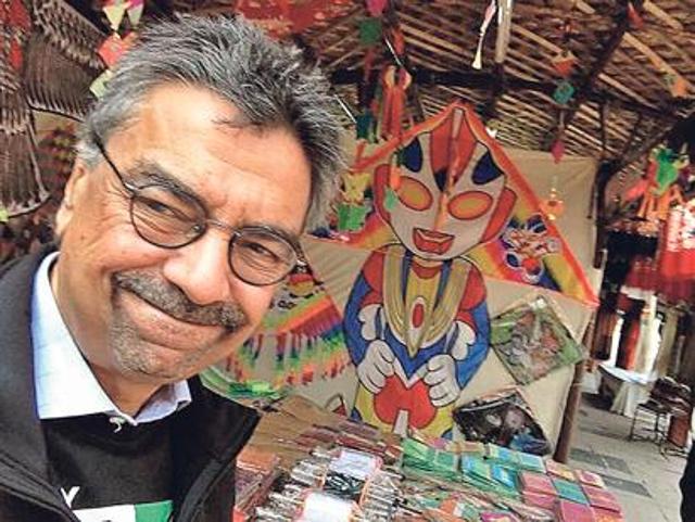 Khalid Mohamed with the art work.