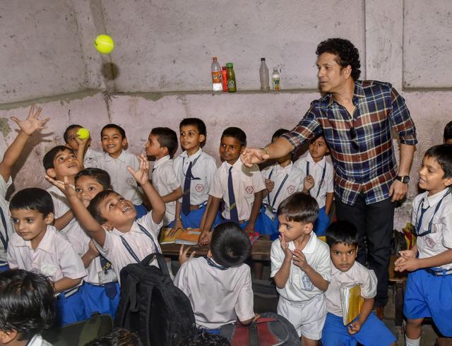 Sachin Tendulkar interacts with students during a surprise visit to a school in Mumbai. (PTI File Photo) Sachin Tendulkar interacts with students during a surprise visit to a school in Mumbai. (PTI File Photo)