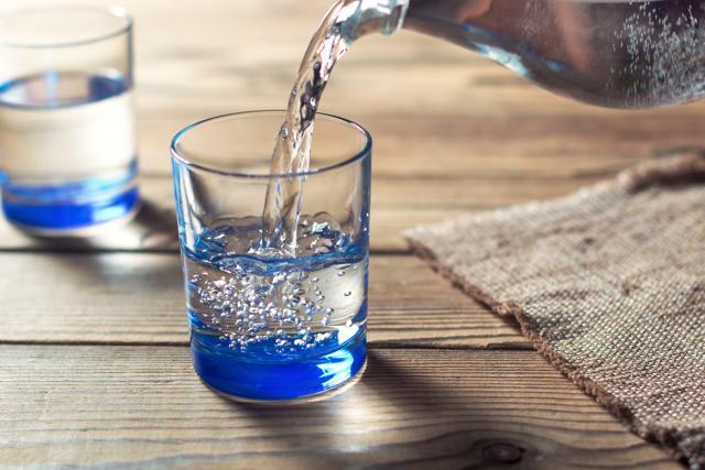 Avoid alcohol and drinks with caffeine. Instead have plenty of water. (Getty Images/iStockphoto)