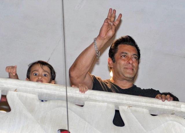 Salman Khan gestures as he arrives at his house. (PTI) Salman Khan gestures as he arrives at his house. (PTI)