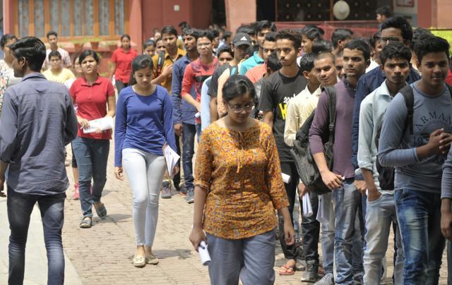 Students coming out of the JEE Mains exam at Bal Vidya Mandir in Lucknow on Sunday.  (HT photo/Deepak Gupta)