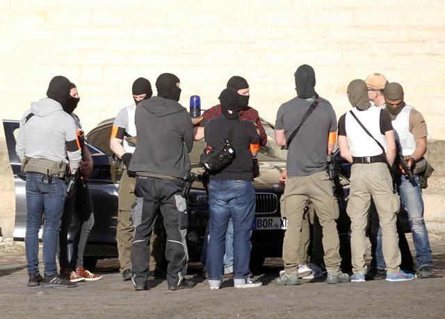 Special police gather in a street near a place where a man drove a van into a group of people sitting outside a popular restaurant in the old city centre of Muenster, Germany, April 7, 2018. (Reuters Photo) Special police gather in a street near a place where a man drove a van into a group of people sitting outside a popular restaurant in the old city centre of Muenster, Germany, April 7, 2018. (Reuters Photo)