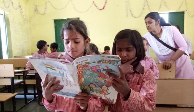 A reality check of a primary school in Naubasta Kala in Chinhat block of Lucknow revealed that students are yet to receive their new textbooks in English. They were found reading lessons from old books in Hindi. (Deepak Gupta/HT photo) A reality check of a primary school in Naubasta Kala in Chinhat block of Lucknow revealed that students are yet to receive their new textbooks in English. They were found reading lessons from old books in Hindi. (Deepak Gupta/HT photo)