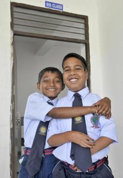 Kamaljit Singh with his friend Sunny at the school. (Gurminder Singh/HT)