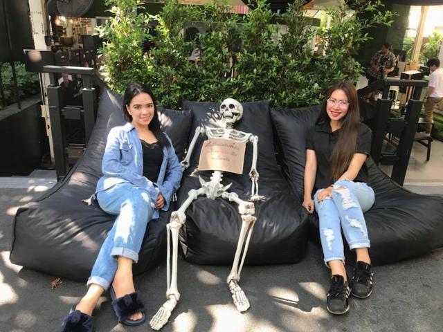 A skeleton splayed out on a couch in the corner. (Facebook) A skeleton splayed out on a couch in the corner. (Facebook)