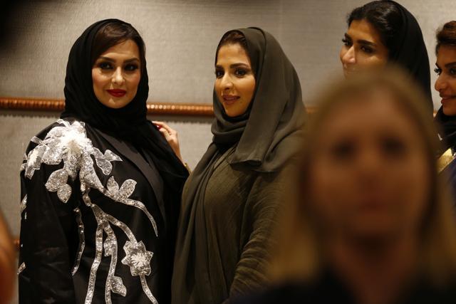 Women attend the Arab Fashion Week in Riyadh, Saudi Arabia. (REUTERS) Women attend the Arab Fashion Week in Riyadh, Saudi Arabia. (REUTERS)