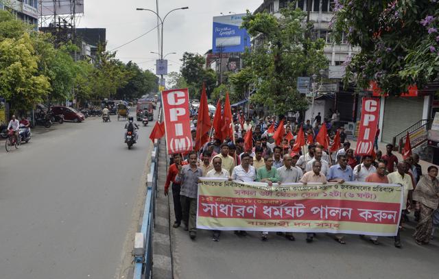 CPI(M) supporters bring out a rally in Siliguri on Friday. (AFP) CPI(M) supporters bring out a rally in Siliguri on Friday. (AFP)