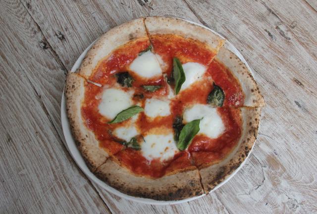 The Neapolitan pizzas prepared in a wood-fired oven are superb, with their charred edges and runny but robust sauce. (Bhushan Koyande / HT Photo) The Neapolitan pizzas prepared in a wood-fired oven are superb, with their charred edges and runny but robust sauce. (Bhushan Koyande / HT Photo)