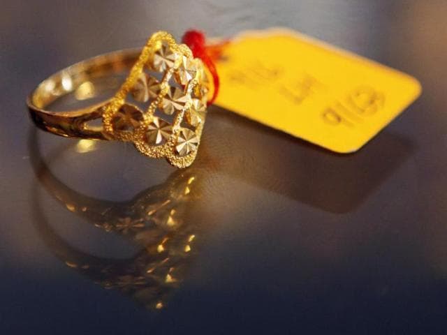 Opt for pure gold jewellery. While precious stones do add to the beauty of jewellery, they lower the value of an ornament. (Reuters file photo ) Opt for pure gold jewellery. While precious stones do add to the beauty of jewellery, they lower the value of an ornament. (Reuters file photo )
