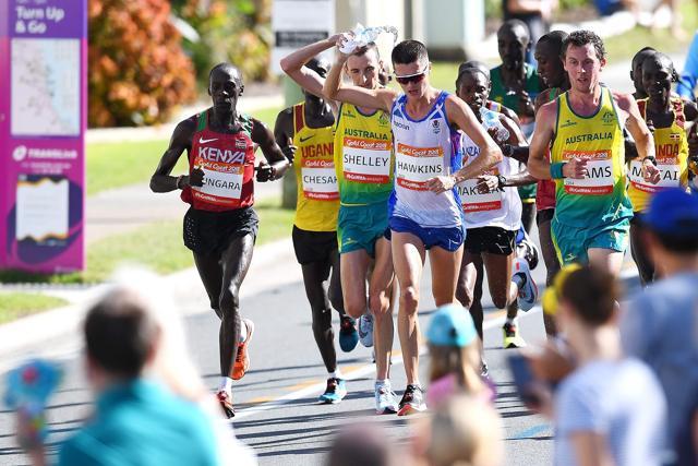 Scotland's Callum Hawkins (C) was leading the men's marathon final when he collapsed. (AFP) Scotland's Callum Hawkins (C) was leading the men's marathon final when he collapsed. (AFP)