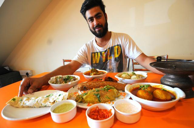 A visitor enjoying Kashmiri food in a restaurant at Kharar on Friday. (Ravi Kumar/HT) A visitor enjoying Kashmiri food in a restaurant at Kharar on Friday. (Ravi Kumar/HT)