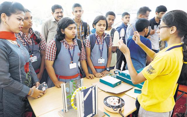 Children enjoying a science exhibition on the Science Day at SPPU, IUCAA on February 28, 2018. (Rahul Raut/HT PHOTO)