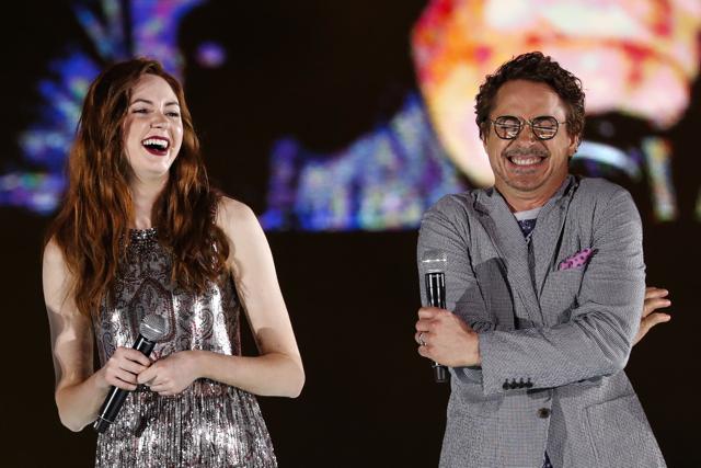 Karen Gillan and Robert Downey Jr. share a laugh during Marvel's Avengers: Infinity War red carpet fan event in Singapore. (AP)