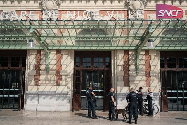 Security personnel of French national railway operator Societe Nationale des Chemins de Fer (SNCF) stand outside Nice-Ville railway station during the strike. (Bloomberg) Security personnel of French national railway operator Societe Nationale des Chemins de Fer (SNCF) stand outside Nice-Ville railway station during the strike. (Bloomberg)