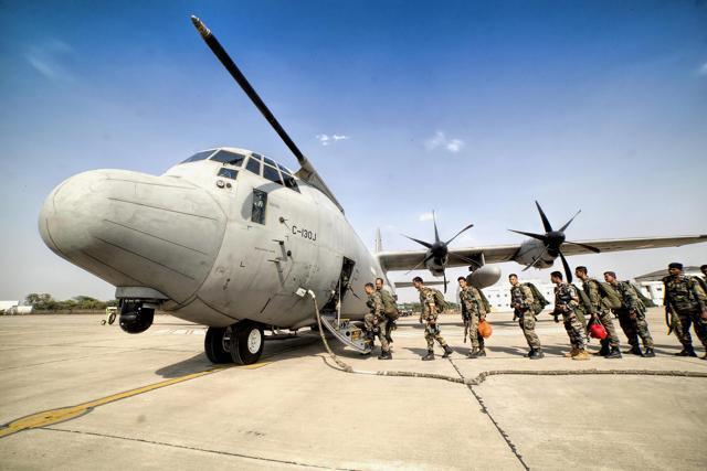 In this undated photo provided by the Air Force, soldiers board a C-130J plane during the ongoing IAF exercise ‘Gagan Shakti-2018’. (PTI) In this undated photo provided by the Air Force, soldiers board a C-130J plane during the ongoing IAF exercise ‘Gagan Shakti-2018’. (PTI)