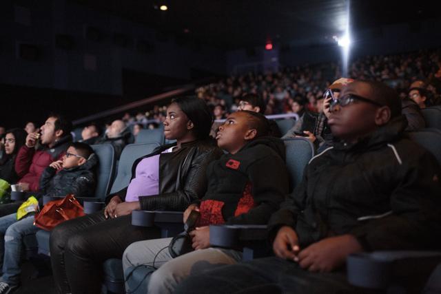 Jeremiah Blake and his mother, who is pregnant and expecting a baby in May, watch Black Panther at College Point Multiplex Cinema in Queens, Feb. 17, 2018. (NYT) Jeremiah Blake and his mother, who is pregnant and expecting a baby in May, watch Black Panther at College Point Multiplex Cinema in Queens, Feb. 17, 2018. (NYT)