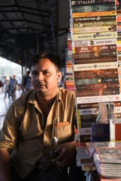 Nitesh Kumar, a books seller at platform seven of New Delhi Railway Station. (Photo: Sarang Gupta/HT)